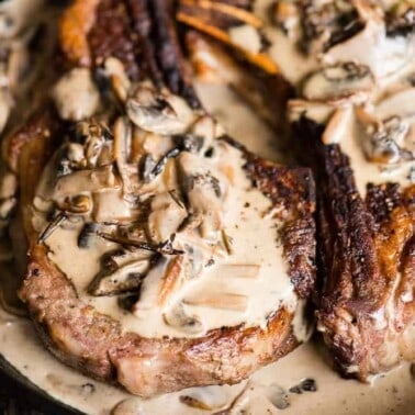 Pan Seared Ribeye Steak with Creamy Mushroom Sauce unites the most tender and flavorful cut of beef with a rich savory finish. It's the kind of meal you crave. This is also the best dinner to explore the perfect wine pairing. Is there anything better than a buttery steak smothered in sauce?