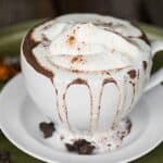 Pumpkin Spice Hot Chocolate with real pumpkin puree is a classic warm fall drink. Make a single cup for you or a batch in the slow cooker for a crowd!