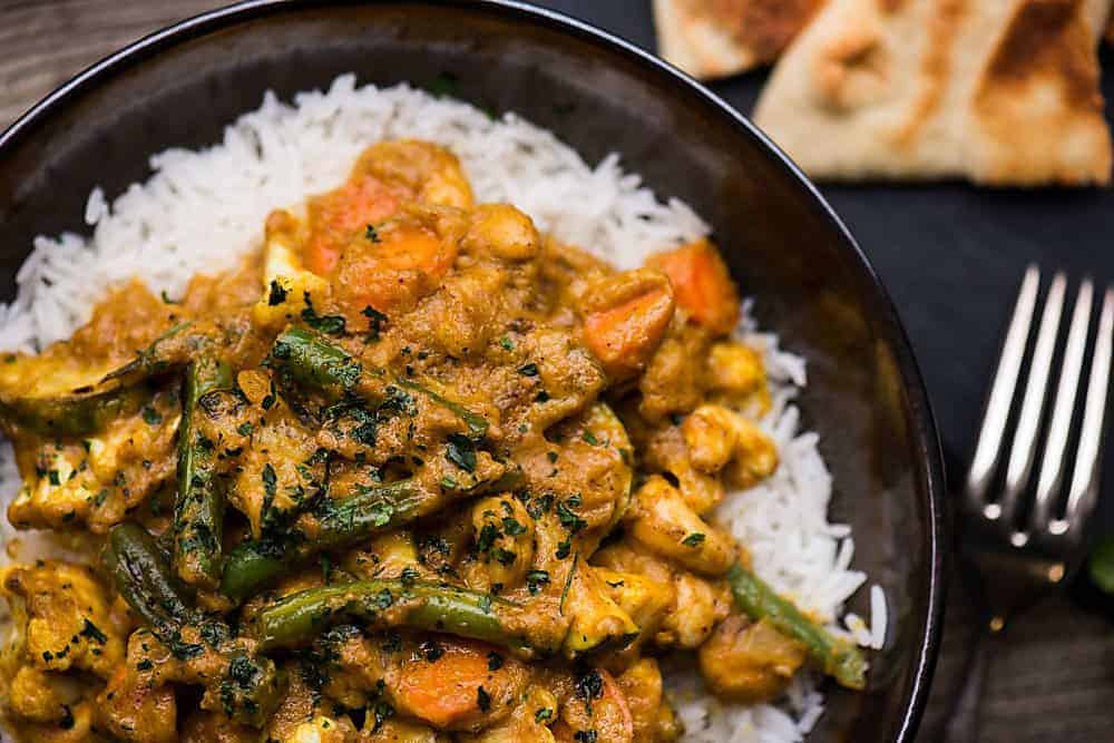 A plate of food close up of vegetable korma