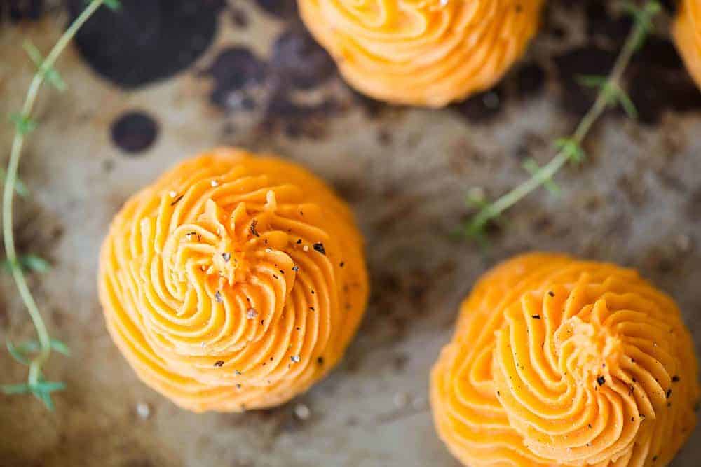 Whipped Sweet Potatoes are a simple two ingredient fall flavored side dish. They are an incredibly creamy vegetarian, vegan, and paleo super food.