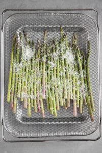 asparagus with parmesan in air fryer basket