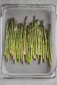 air fried asparagus in metal basket