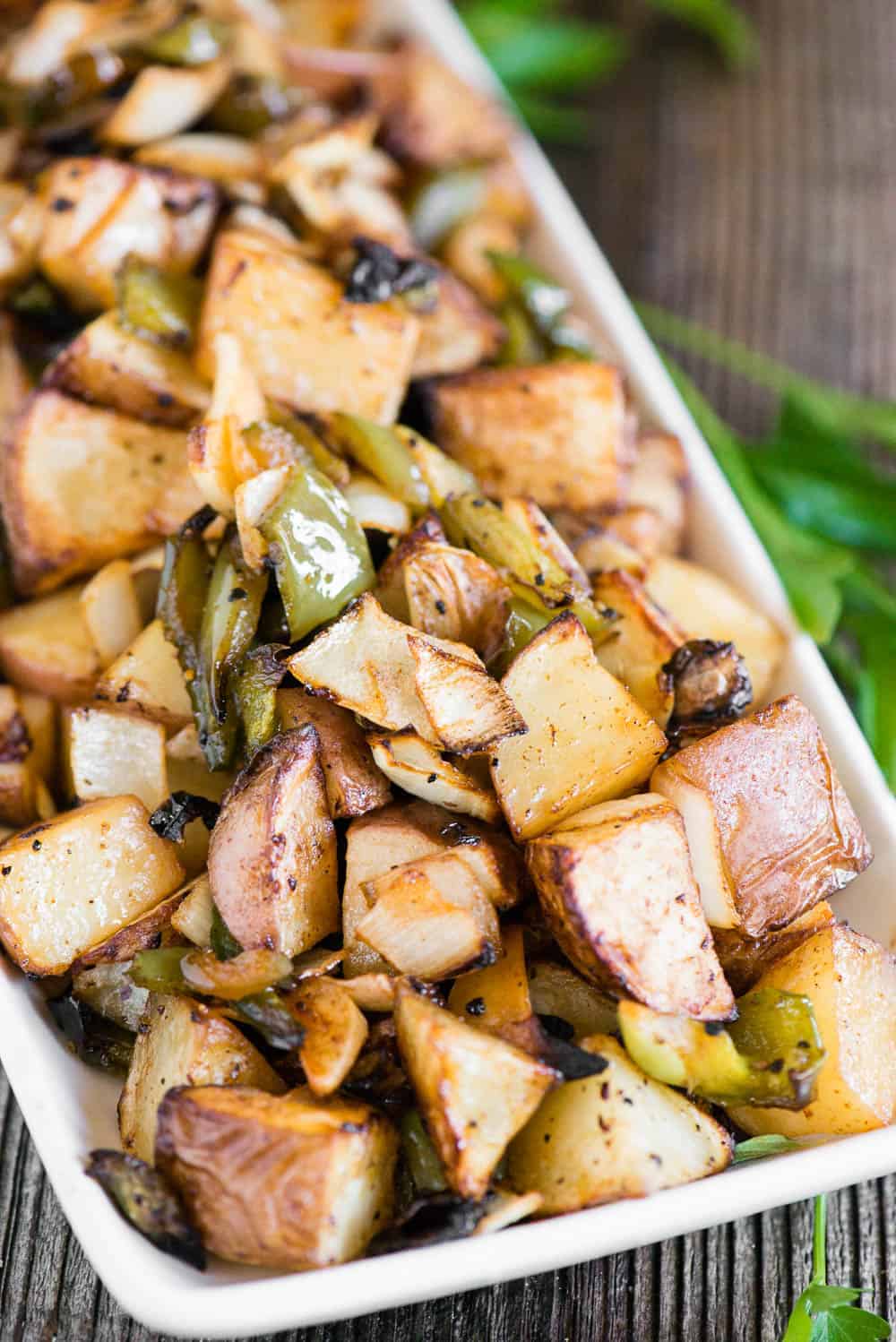 potatoes, peppers, and onions on platter