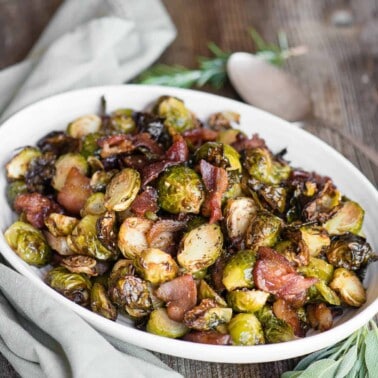 air fried brussels sprouts and bacon on white oval dish