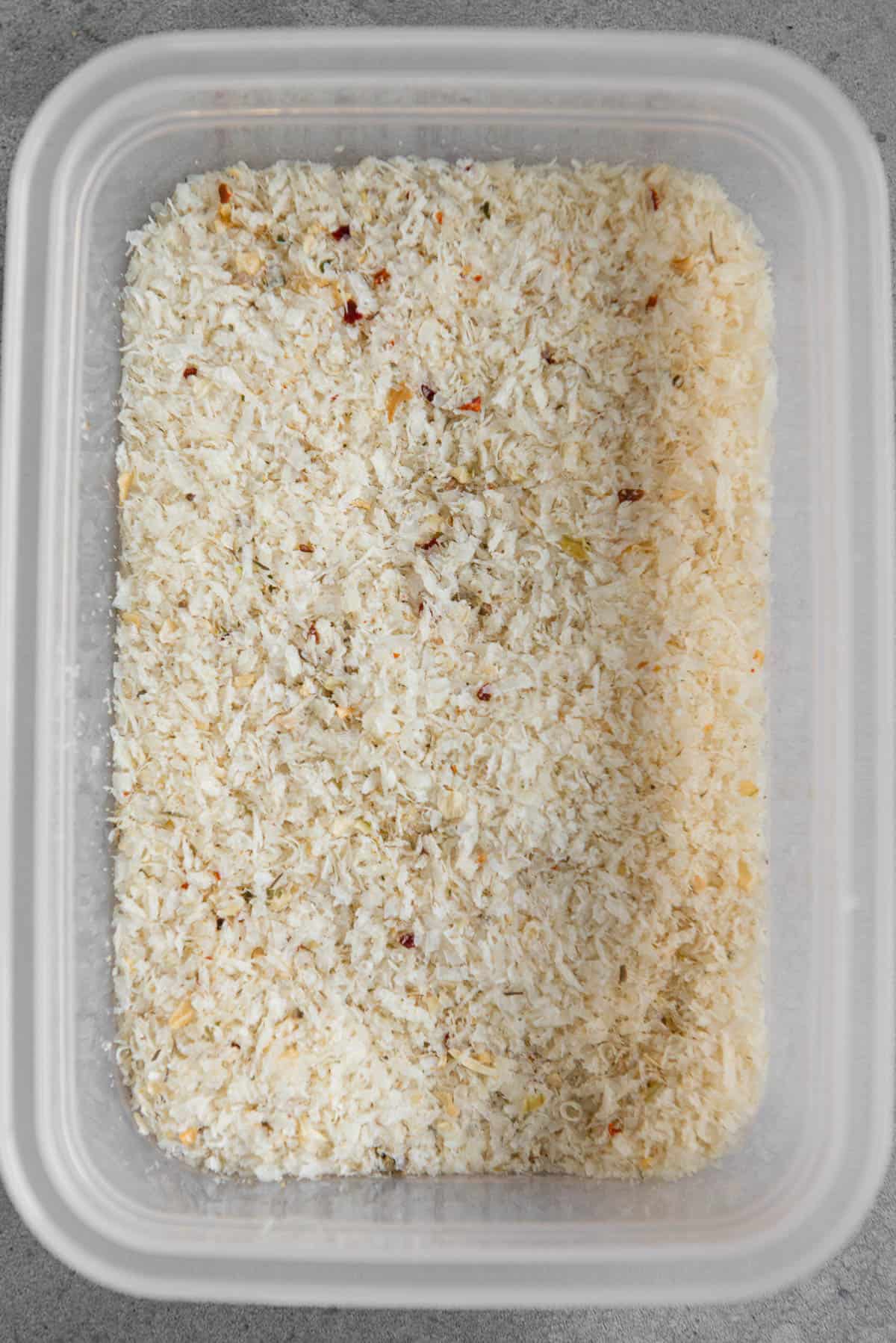 container with bread crumbs and parmesan