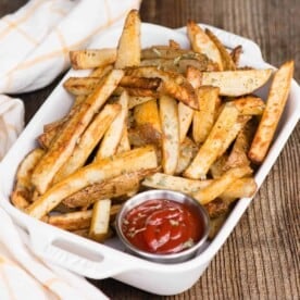 basket of fries with ketchup
