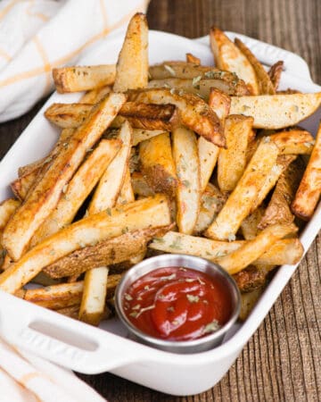 basket of fries with ketchup