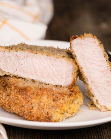 breaded pork chop cut in half