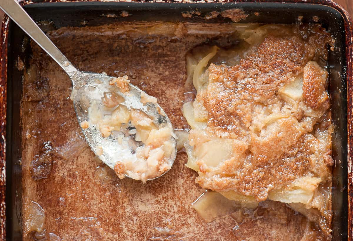 Homemade apple brown betty in baking dish. Only one portion left.