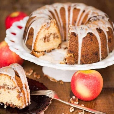 Apple Pecan Bundt Cake is an easy, made from scratch moist cake recipe full of your favorite fall flavors. It is perfect to enjoy for breakfast or dessert!
