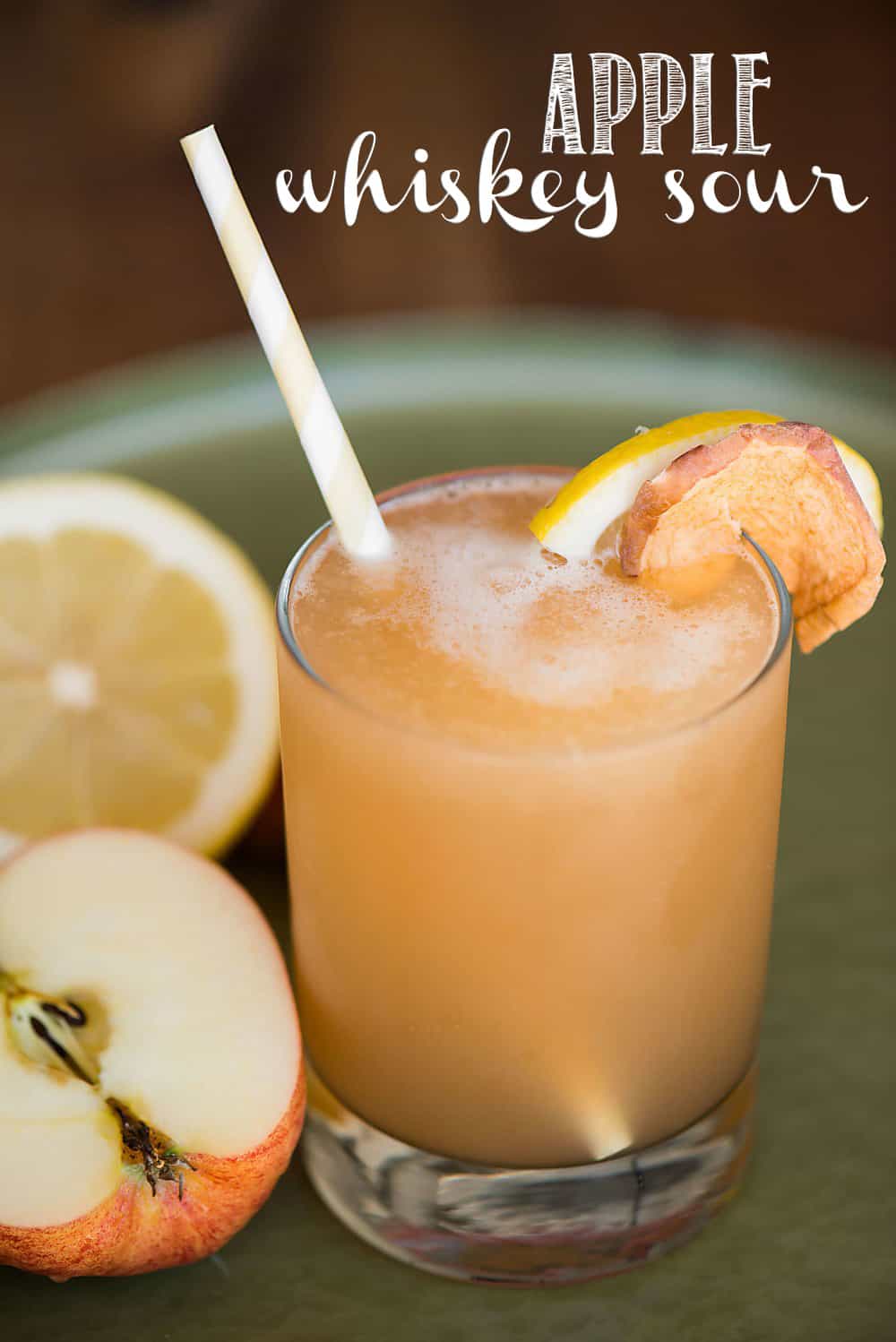 a glass of apple whiskey sour
