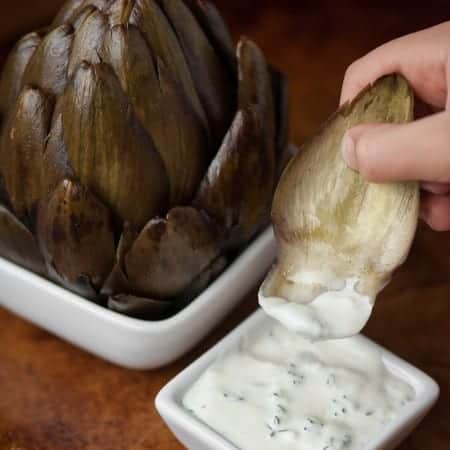 If you love a delicious hot artichoke as much as I do, then you will find nothing better than my easy to make Artichoke Dipping Sauce with lemon and thyme.