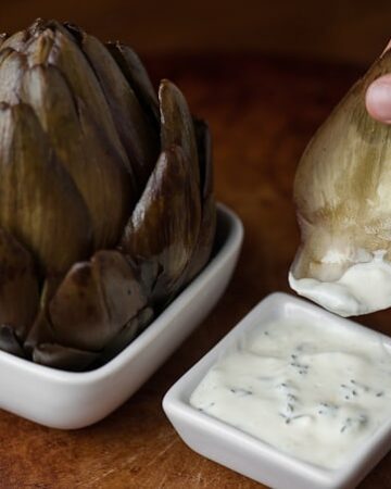 If you love a delicious hot artichoke as much as I do, then you will find nothing better than my easy to make Artichoke Dipping Sauce with lemon and thyme.