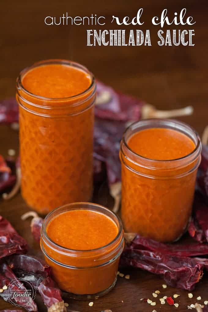 three mason jars filled with homemade enchilada sauce