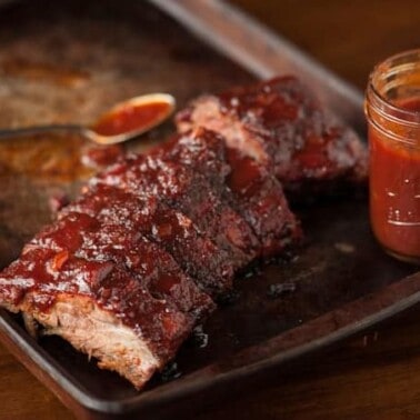 Enjoy summer grilling at its best with these Babyback Ribs with BOOM Sauce. The quick & easy homemade BBQ sauce has a secret ingredient with a real kick!