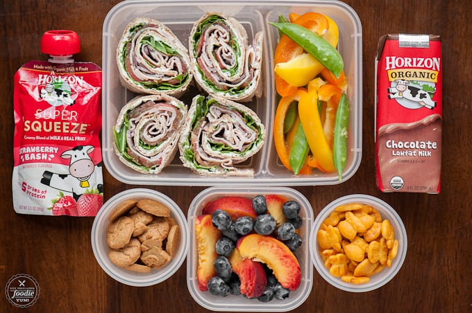 lunch with turkey pinwheels, peppers, fruit and cookies