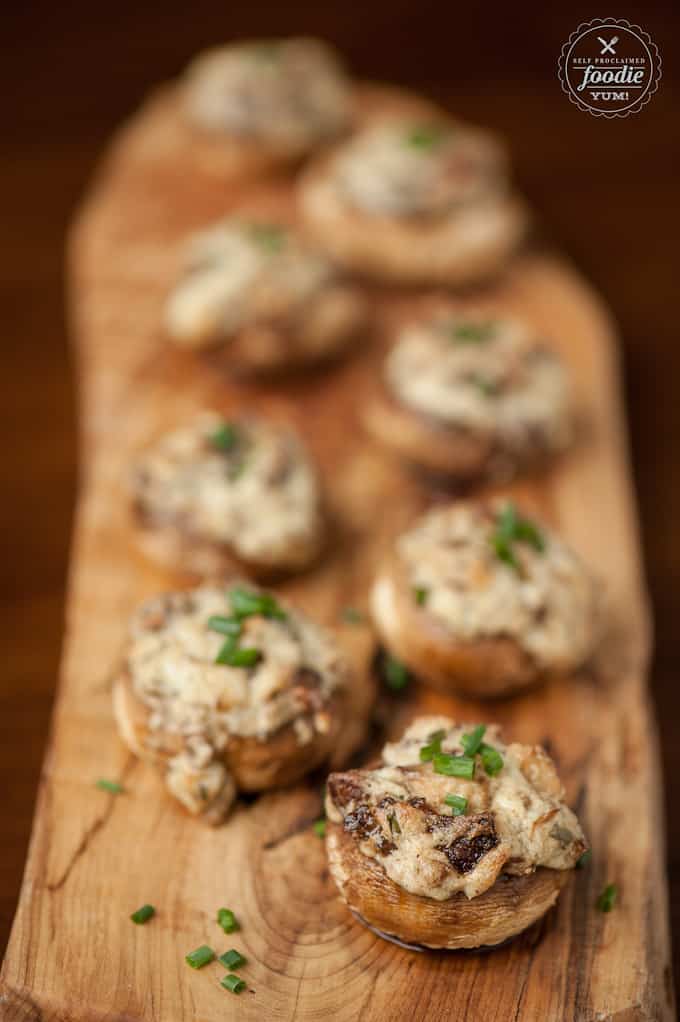 stuffed mushrooms on a cutting board