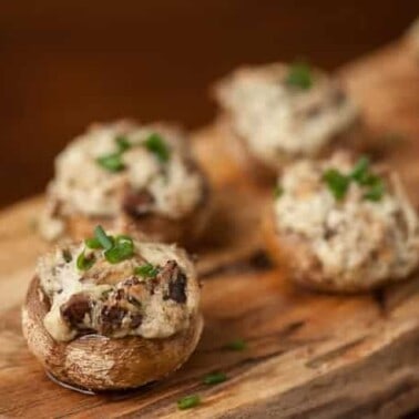 These Bacon Blue Cheese Stuffed Mushrooms are an incredibly rich and decadent appetizer that are the perfect party finger food everyone will love.