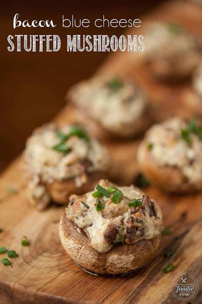 bacon blue cheese stuffed mushrooms on a cutting board