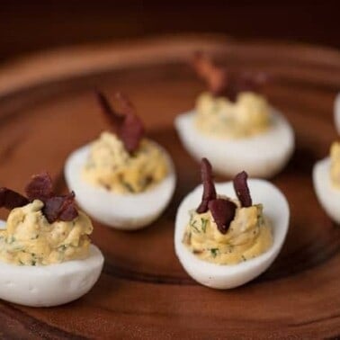 Bacon Jalapeño Deviled Eggs are a spicy two bite appetizer that people love, especially as game day grub or during a party.