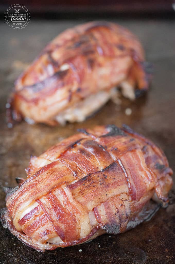 bacon weave over chicken breast on baking sheet