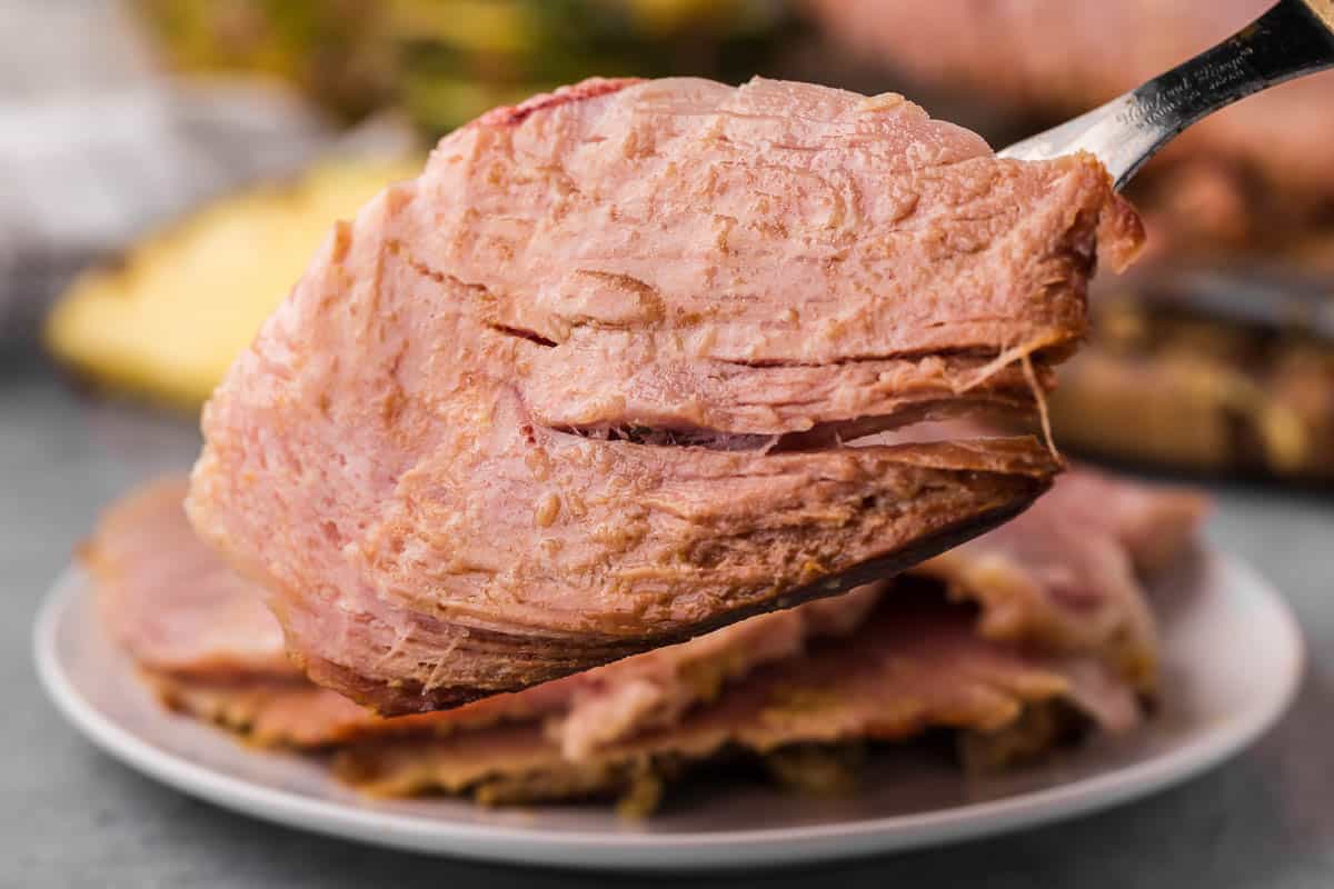 juicy tender slice of glazed baked ham.