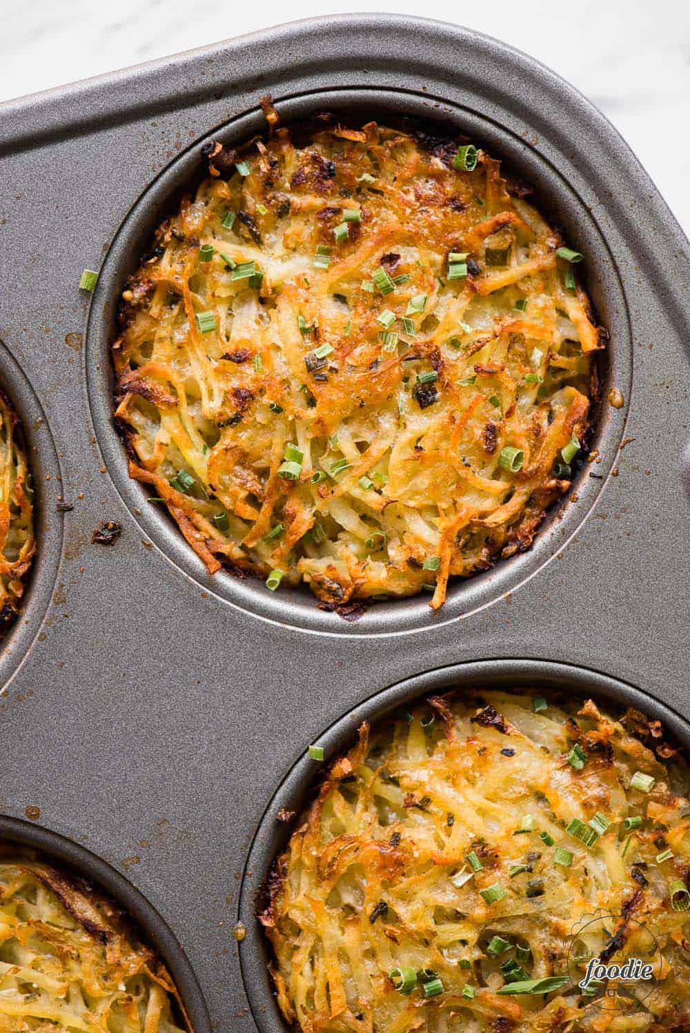 baked parmesan hashbrowns in muffin tin