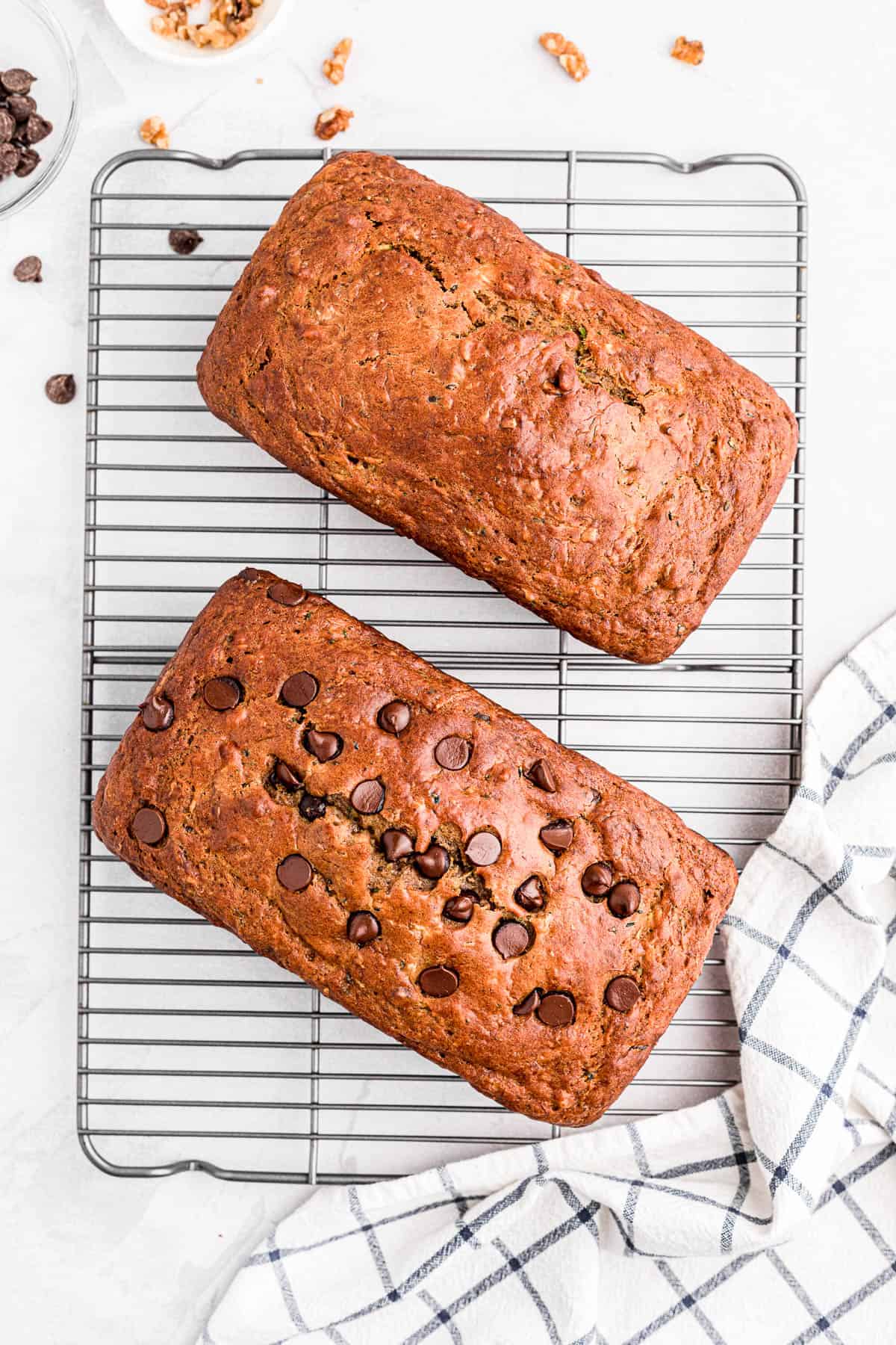 baked banana zucchini bread loaves on cooling rack.