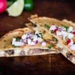 Barbacoa Quesadillas are made quick and easy by pressure cooking the beef roast with an amazing chipotle sauce, then melting cheese in the best tortillas.
