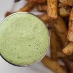 Basil Garlic Aioli sauce made from scratch only takes a few easy minutes and the result is a flavorful dip or spread that packs a real raw garlic punch.