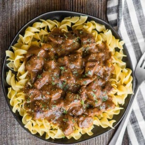 plate of beef and noodles with brown gravy