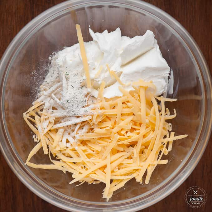bowl of cream cheese, ranch seasoning mix, and shredded cheddar cheese