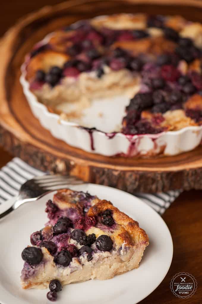 bread pudding with berries on plate