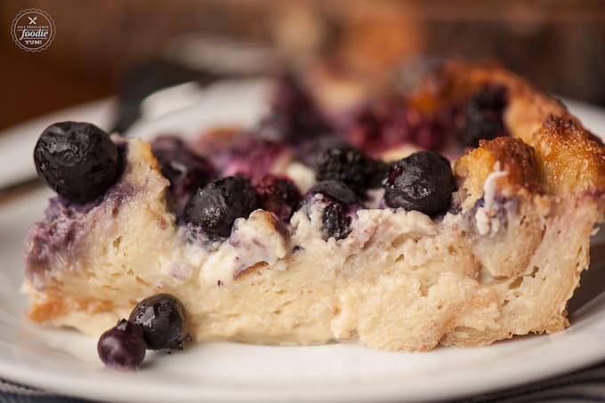 slice of bread pudding with blueberries
