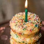 Colorful Birthday Cake Baked Donuts are a real treat for any occasion. This easy to make recipe will put a smile on anyone's face!