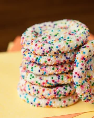 Making Birthday Cake Sugar Cookies from scratch is super easy and don't require you to chill and roll the dough which makes them a great anytime treat!