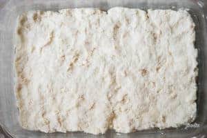 homemade biscuit dough in pan for biscuits and gravy casserole recipe