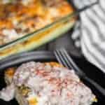 plate with a piece of homemade biscuits and gravy casserole