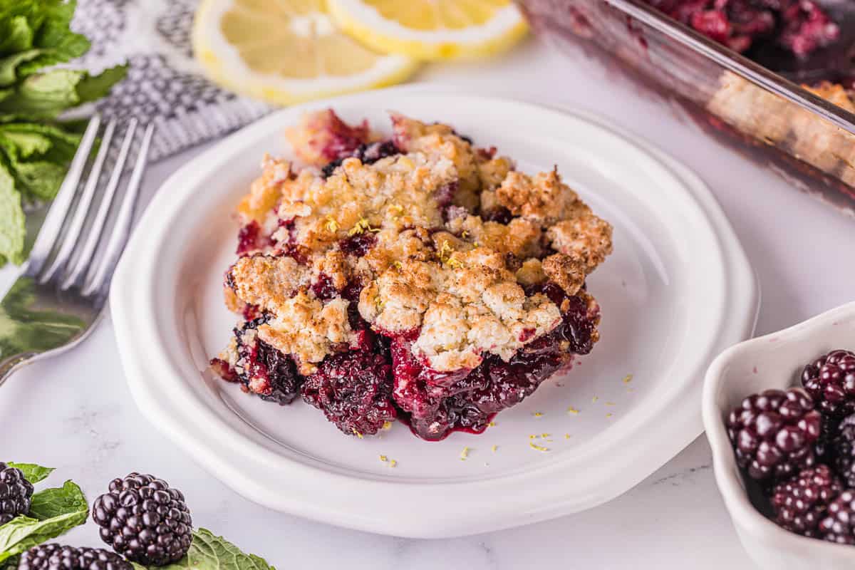 serving of blackberry cobbler on plate.