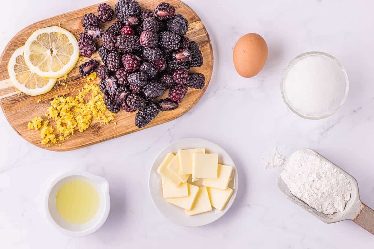 ingredients needed to make homemade blackberry cobbler.