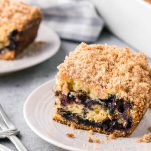 slice of blueberry coffee cake on plate.