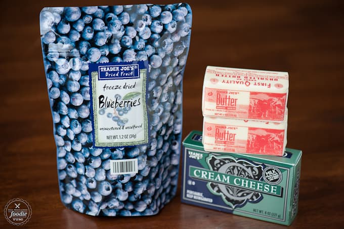 freeze dried blueberries, butter and cream cheese on table