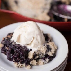 blueberry cake mix cobbler with scoop of vanilla ice cream