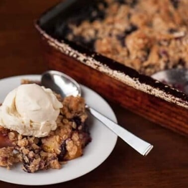 Eating Blueberry Peach Crisp for dessert is just like eating the most delicious oatmeal cookie you've ever had with the added benefit of warm summer fruit!