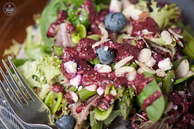 A close up of a salad, with Blueberry Vinaigrette