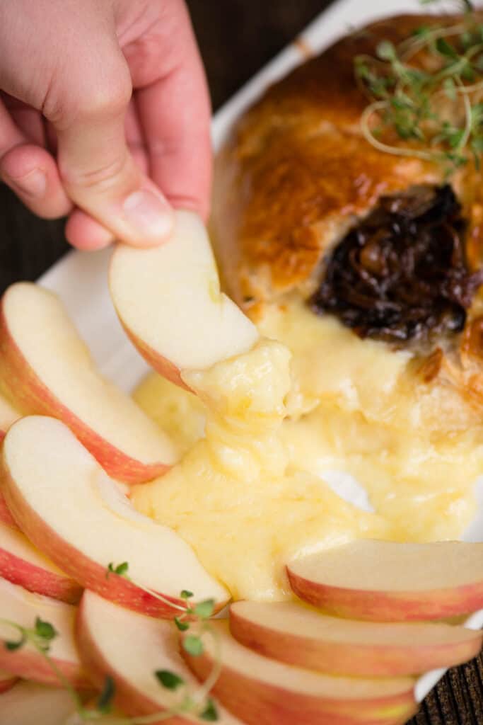 apple slice with warm baked brie