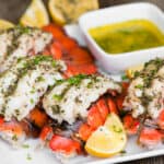 lobster tails with melted butter and lemons