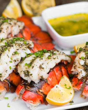lobster tails with melted butter and lemons