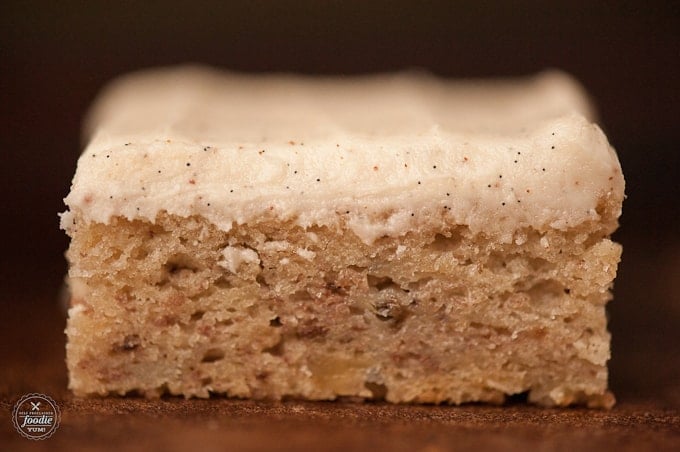 side view of a banana bar with vanilla bean frosting