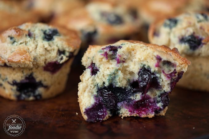 A close up of a homemade blueberry muffin split in half